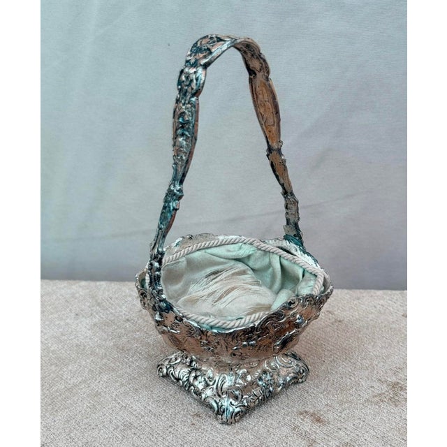 Exceptional antique Weidlich Brothers Manufacturing Co. silver-plated ornamental basket, circa 1890–1910, Bridgeport,...