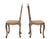 A very nicely proportioned pair of louis xv style side chairs, the foliate carved chanel moulded frames in a distressed...