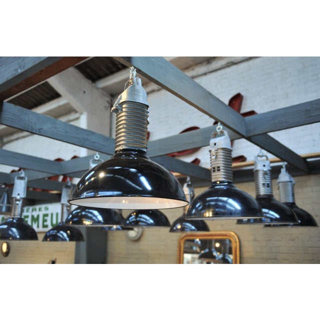 Large Industrial Pendant Light from Philips, 1950s, in Very Good conditions. Designed 1950 to 1959 This piece has an...