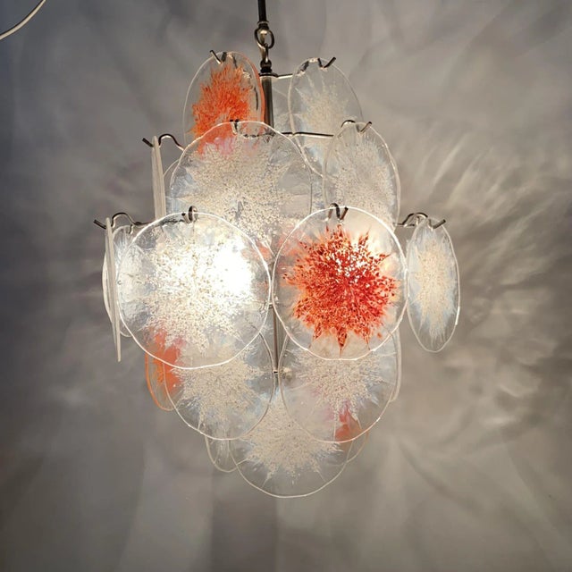 A very beautiful Vistosi Disc light, blown Murano glass disk shaped components on a chromed steel structure. Adjustable...