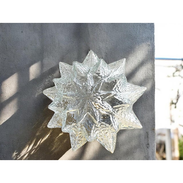 This beautiful vintage light was made in Portugal in the 1990s. It can be used as a ceiling or wall lamp. It is made of...