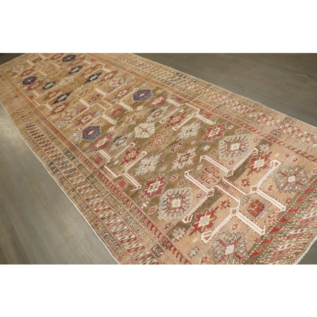 A rare gallery size caucasian shirvan tribal rug from the early 20th century