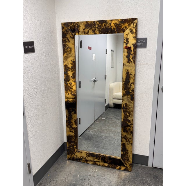 Design Plus Gallery presents a Tortoise Glass Full-Length Mirror. This full-length mirror has a wide tortoise glass frame...