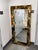 Design Plus Gallery presents a Tortoise Glass Full-Length Mirror. This full-length mirror has a wide tortoise glass frame...