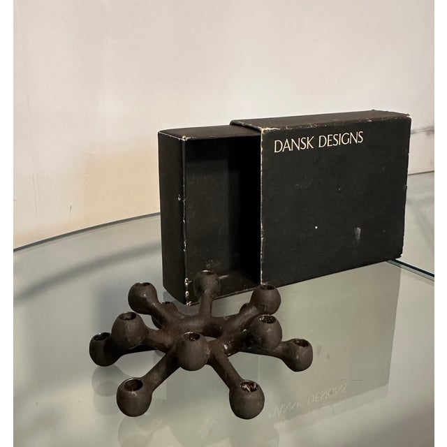 A striking and iconic example of mid-century Danish design, this “Spider” candle holder was designed by Jens Quistgaard...