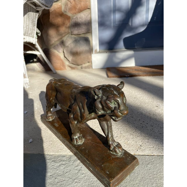 A finely cast 19th‑century French bronze of a walking tiger by Antoine‑Louis Barye (1797–1875), the master of Romantic...