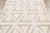 Hand-tufted in wool, this 4x6 contemporary geometric rug showcases an allover nested triangle pattern in soft beige and...