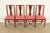 A gorgeous set of four Federal or Hepplewhite style dining chairs In the manner of Baker Furniture USA, Circa 1940s Carved...