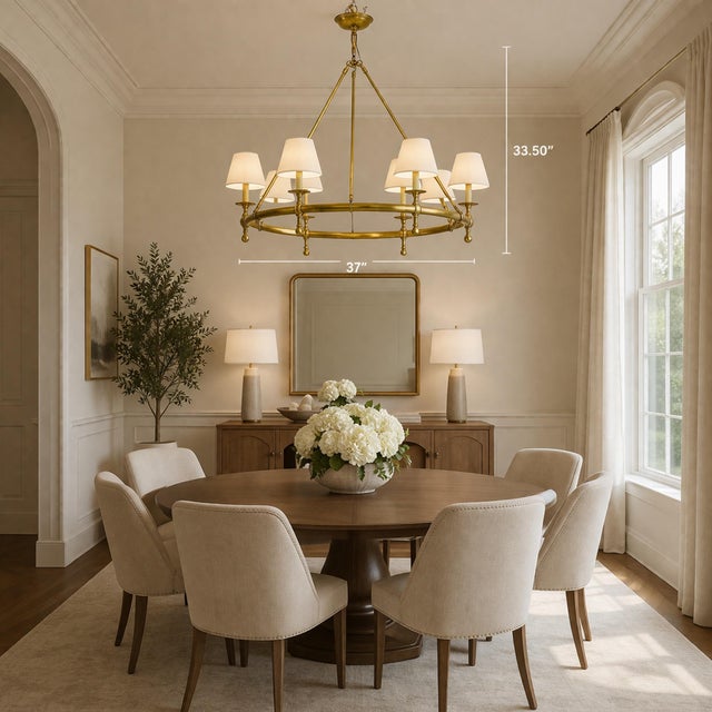 An elegant and highly desirable 6-light ring chandelier designed by Chapman & Myers for Visual Comfort, executed in a rich...