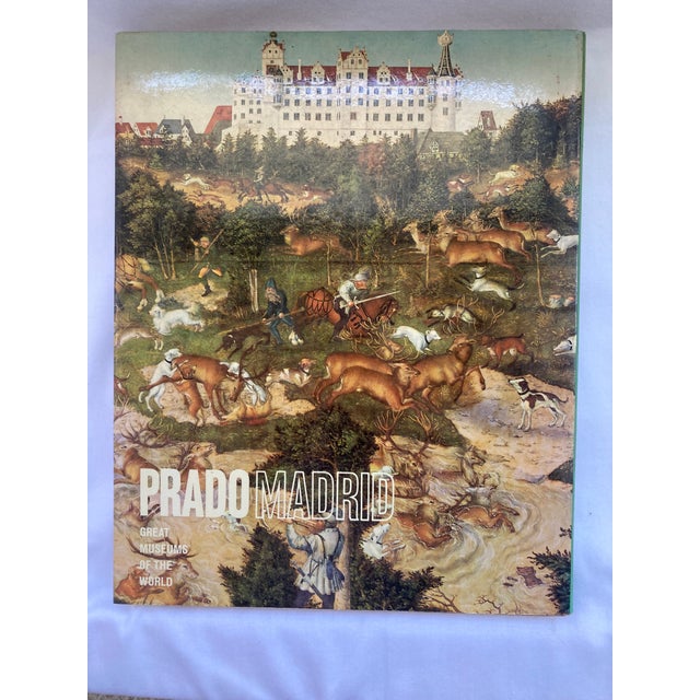 A 12 x 9 Hardbound Coffee Table Book with Leather Bound Cover and Original Jacket, It presents the art treasures of Spain...