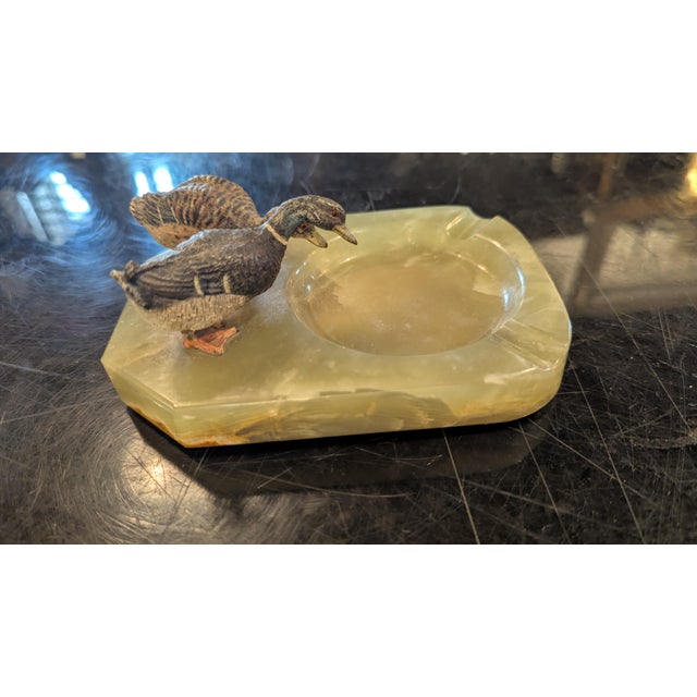 Antique Bronze Cold Painted Ducks on Onyx Base Ashtray onyx is a green. 2 cigarette valleys.