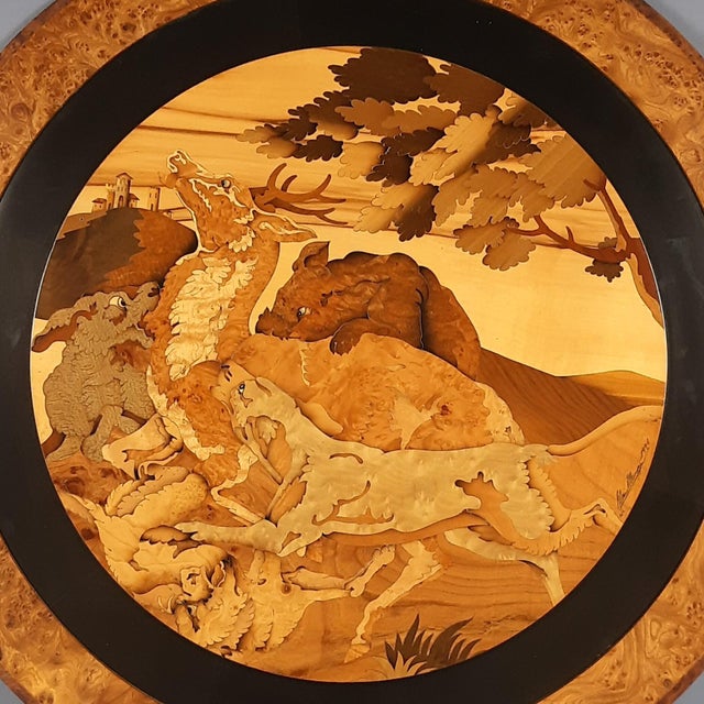 A magnificent and imposing circular wall painting, a product of the great tradition of Italian cabinetmaking (likely from...