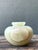 This elegant vintage stone onyx vase highlights the timeless beauty of natural materials through its refined form and...