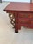 This traditional Chinese antique red lacquered wooden table is a striking expression of classical Chinese craftsmanship,...