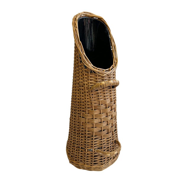 A vintage coal kit covered in rattan/wicker. It can be used as a decorative object by the fireplace, but also as an...