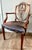 Striking Set of eight antique mahogany Hepplewhite centennial dining chairs, consisting of two armchairs and six side...