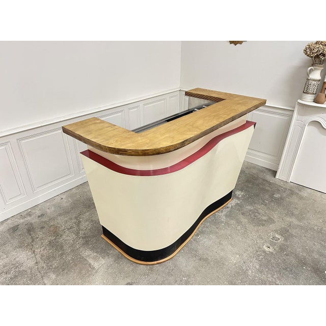 Still functional, this small vintage bar from the 1970s was designed in oak and formica. Typical of the design of the...