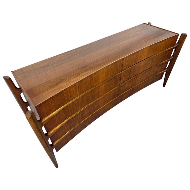 This listing is for a Mid-Century Swedish Modern William Hinn Sculptural Walnut Dresser. Featuring a straight line...