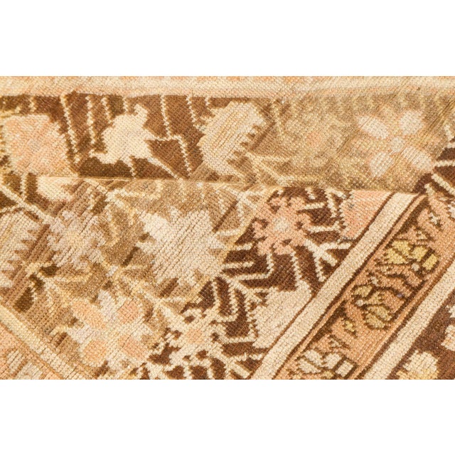 This exquisite antique Karabagh rug, handwoven in the Caucasus region of Russia around the turn of the 20th century,...