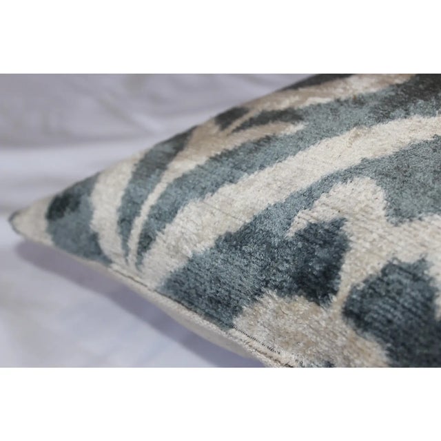 Bohemian silk velvet ikat pillow with vibrant colors of Silver beige and Gray Super hand soft. Pillow has a zipper for...