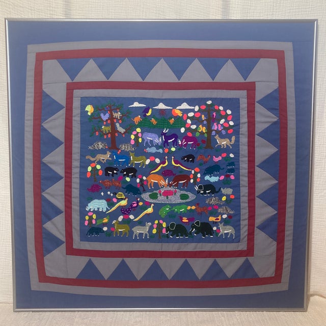 This stunning vintage Hmong story cloth (paj ntaub) is a masterful piece of hand-embroidered textile art, dating back to...