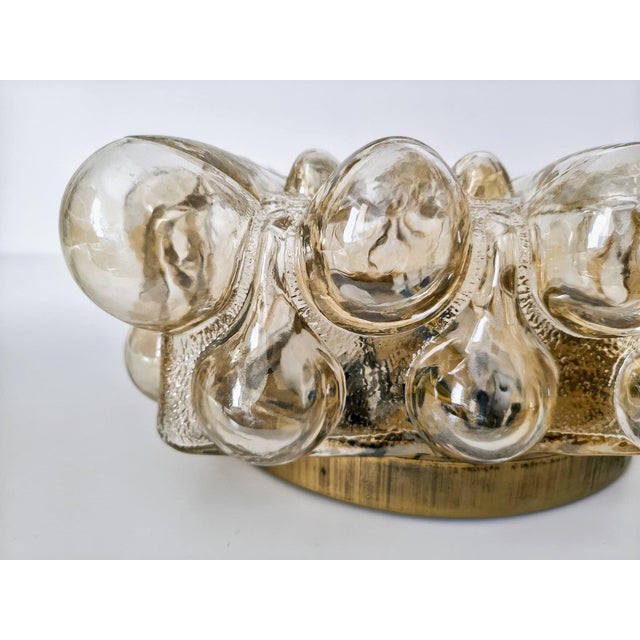 Sculptural 1970s wall or ceiling lamp by Limburg, Germany attributed to Helena tynell. The square shade is made of thick...