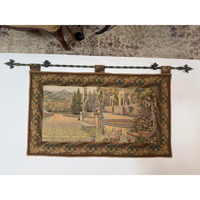 Design Plus Gallery presents a Tapestry with Rod from Hammacher Schlemmer. This scenic design was inspired by old-world...
