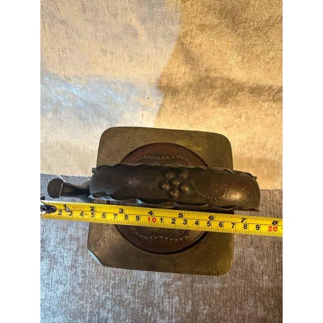 Decorated Metal Art Tea Pot. Raised and brushed flower detail throughout the metal surface. Contrast pieces with more...