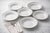 A refined set of six Mikasa Imperial Platinum soup bowls, crafted in fine china with a sleek platinum-banded rim and...