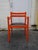 Very rare orange version of the the carimate arm chair with original corssed patterned black skai seating. It has an...