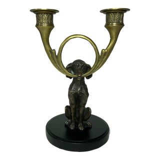 Vintage Bronze Dog Holding a Brass Two Arm Candelabra. For Sale