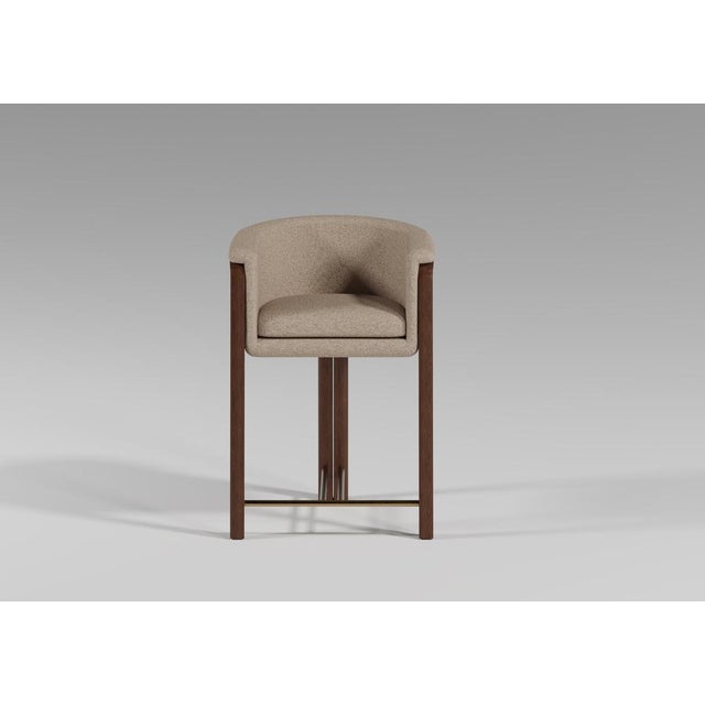 The Modern Agnes Bar Stool is inspired by the concept of a treehouse, offering a cocooning, protective embrace. The...