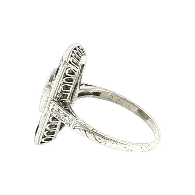 A 20th-century Art Deco ring crafted in platinum. The piece features an approximately 0.50 carat marquise-cut diamond. The...