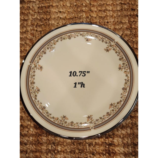 Excellent condition estate Lenox Lace Point China. Twelve dinner plates.