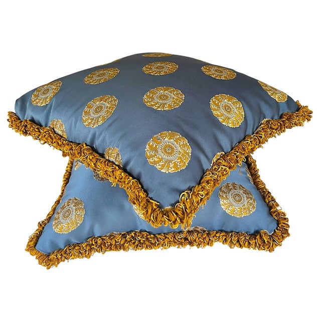 A striking pair of custom-made accent pillows featuring a sophisticated powder blue ground with embroidered ochre, gold,...