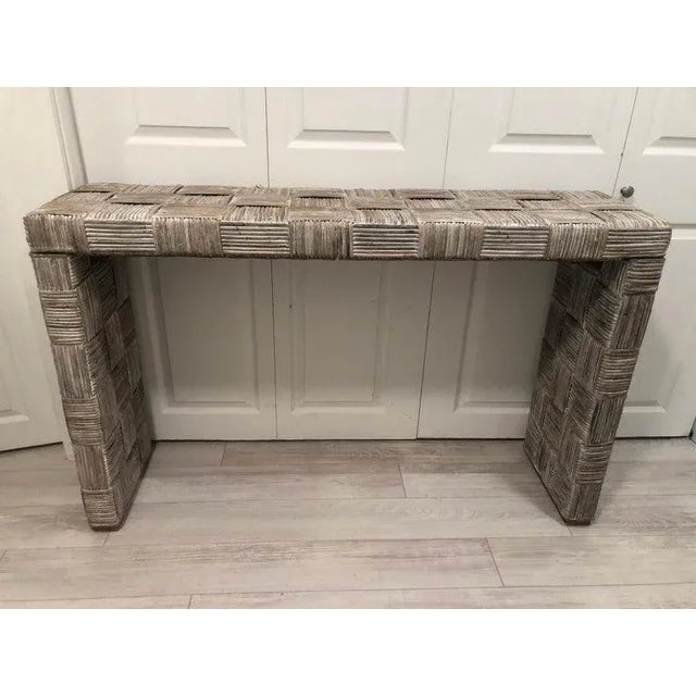 Whitewashed woven rattan console table. Boho chic style with woven crosshatch pattern. Nice narrow table for a minimalist...