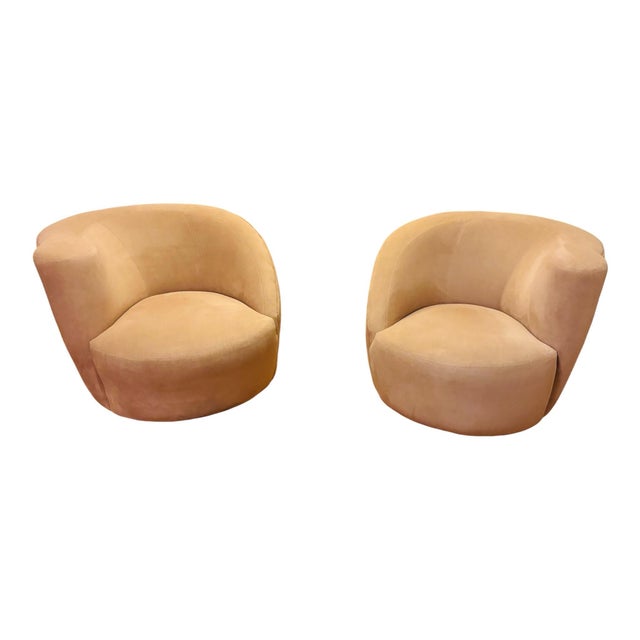 This is a pair of Nautilus Swivel Lounge Chairs with one crescent shaped ottoman, designed by Vladimir Kagan for...