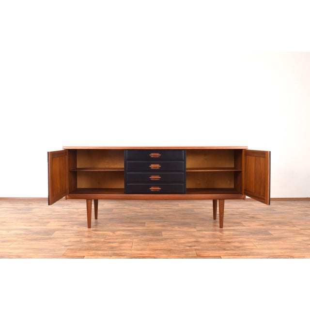 This teak sideboard was designed by Gustav Bahus and produced in Norway in the 1960s. The sideboard has been...