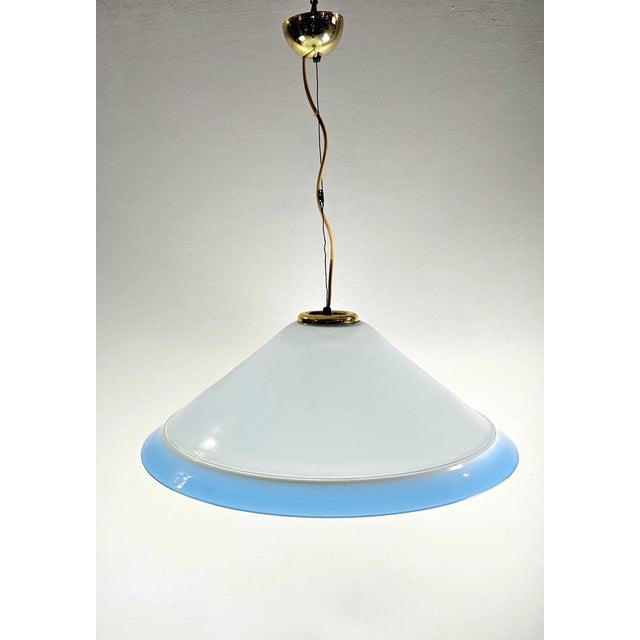 Presenting a cool handmade Murano glass ceiling lamp from the 1970s, characterized by its design featuring white amber and...
