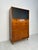 A beautifully crafted three-piece cabinet from the 1960s, made in denmark and executed in warm teak wood. This piece...
