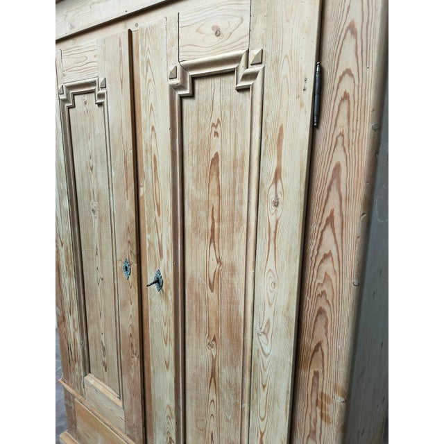 Dimensions: Height 182cm, Width 124cm, Depth 47cm. Wooden wardrobe with a timeless design, two lower drawers. Interior...