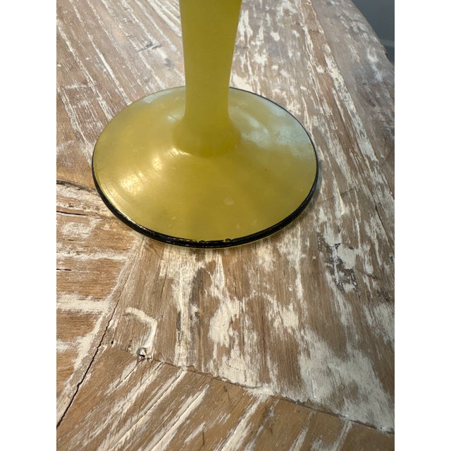 Vintage yellow compote from Lancaster Glass Company. Frosted finish with black rim.