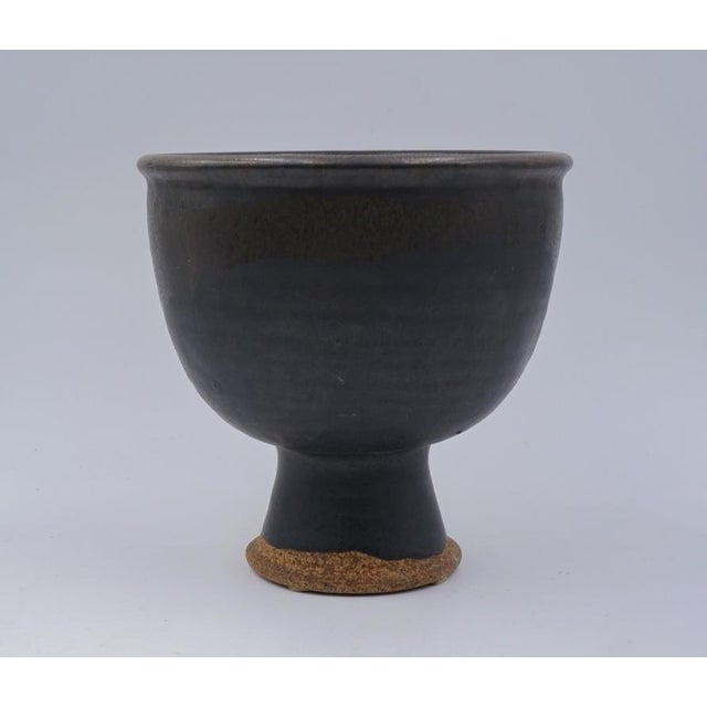 Vintage mid 20th century footed pottery bowl by Joel Edwards (1923 - 2007) California. Signed on bottom, espresso brown...