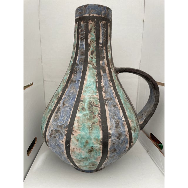 large vintage boho chic pottery vase with handle The vase is signed but I am not familiar with the artist or factory The...