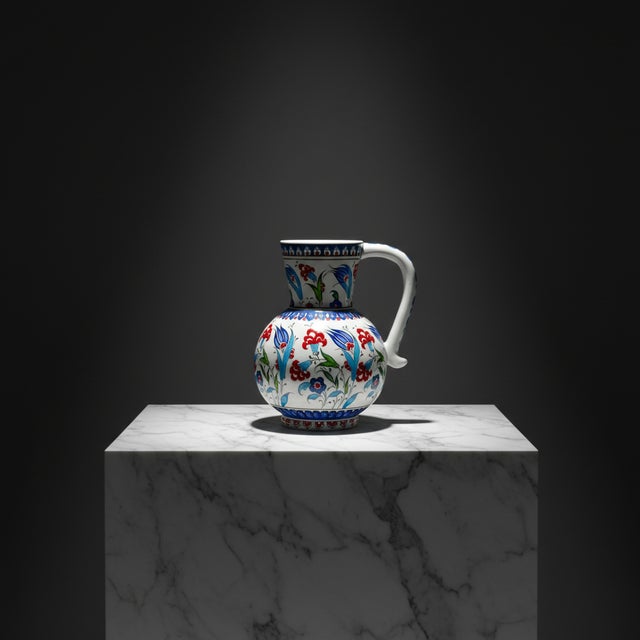 The Garden of Paradise This Handmade Ceramic Pitcher Vase brings the eternal spring of the Ottoman gardens into your home....