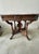 Bring late 19th-century elegance into your space with this exceptional American Victorian Eastlake center parlor table,...