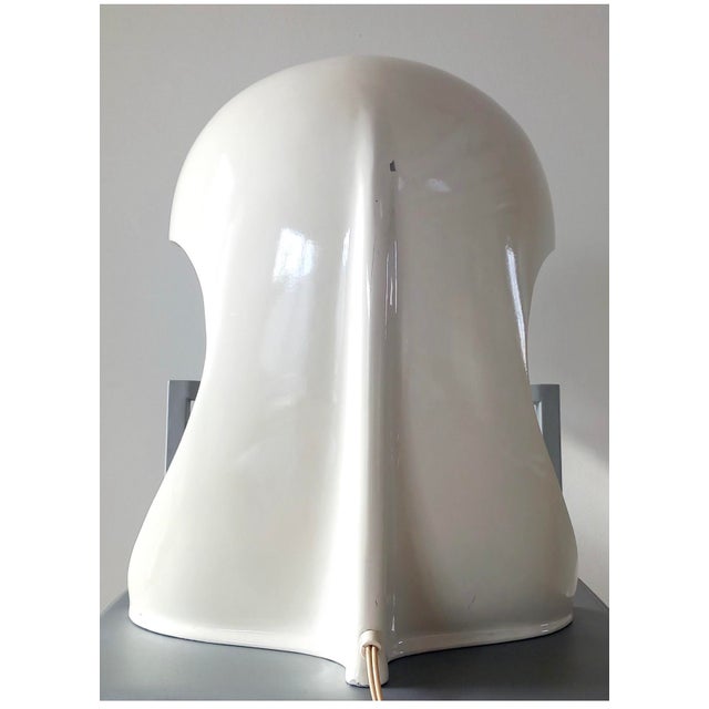 This avant-garde work, both sculpture and light fixture, embodies the futuristic design of the 1960s. Its fluid and...