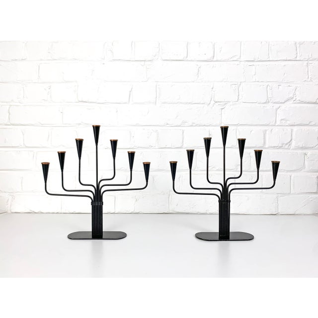 Large pair of Swedish Modern seven-arm candelabras designed by Gunnar Ander for Ystad Metall, Sweden, in the 1950s. Each...
