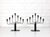Large pair of Swedish Modern seven-arm candelabras designed by Gunnar Ander for Ystad Metall, Sweden, in the 1950s. Each...