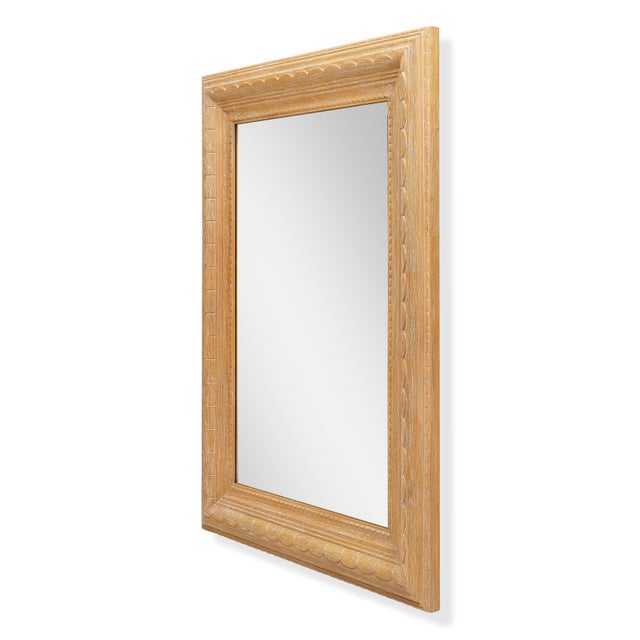 Intricate hand-carved scalloped and beaded detailing give the Cordoba Mirror its quiet authority. The cerused oak finish...